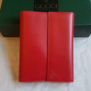 Gucci red leather agenda.